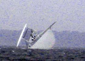 Offshore sailing scene with rig loading in heavy seas
