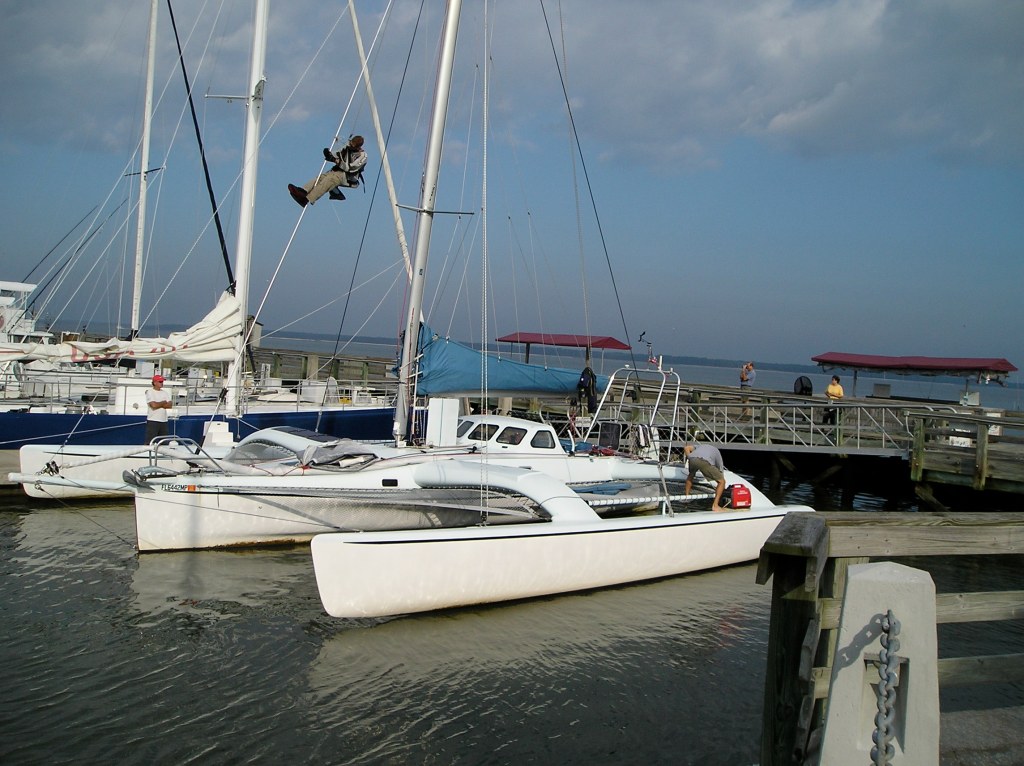 Trimaran under sail showing multihull rig and stays